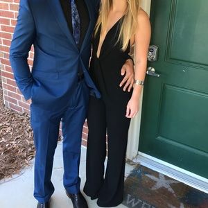 Boutique small black plunging jumpsuit